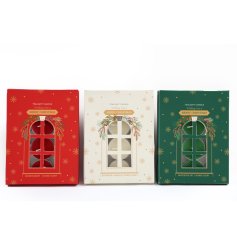 A pack of 12 scented tea lights in Christmassy packaging. 