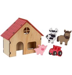 A wooden farmhouse with 4 additional animal and tractor pieces.