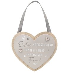 A lovely hanging, wooden heart plaque with the quote 'Sister, my first friend, my best friend, my forever friend'.