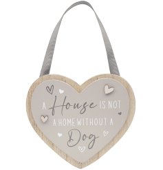 A wooden sign with "A house is not a home without a dog" quote.
