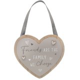 A brown and grey wooden wall sign in the shape of heart.