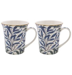  A set of 2 patterned mugs from the William Bough range. 