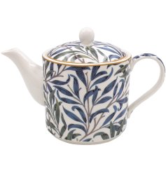 Part of the Willow Bough collection, a green and blue tea pot adorned with an elegant pattern of leaves. 