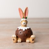 A unique sitting bunny ornament with a Christmas pudding outfit. An unmissable seasonal gift.