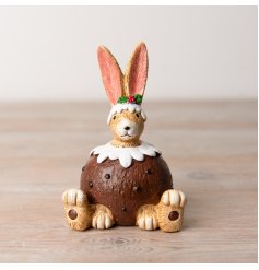 A unique sitting bunny ornament with a Christmas pudding outfit. An unmissable seasonal gift.