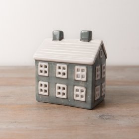 A beautiful tealight house in shades of grey, adorned with a white snowy speckle and 3D cut-out windows.