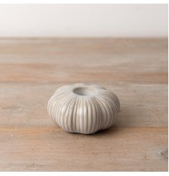 A stunning dinner candle holder in the shape of a pumpkin. 