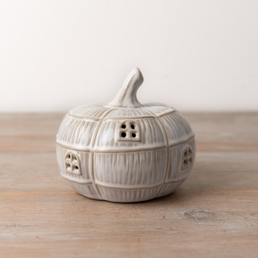 A stunningly enchanting LED pumpkin house complete with a reactive glaze.