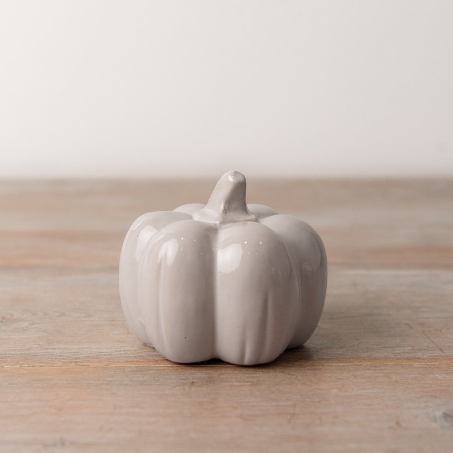 A charming grey ceramic pumpkin, perfectly simple and elegant and will fit seamlessly in any home.