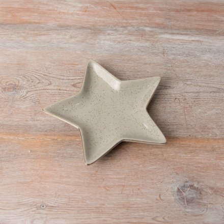 A gorgeous neutral star dish featuring a gold trim and speckle, making it perfect for the festive season.