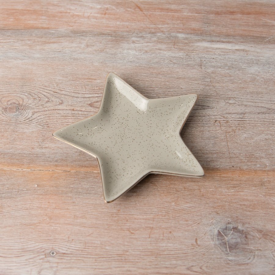 A stunning star-shaped dish in a beautiful neutral hue, adorned with a gold trim and speckles