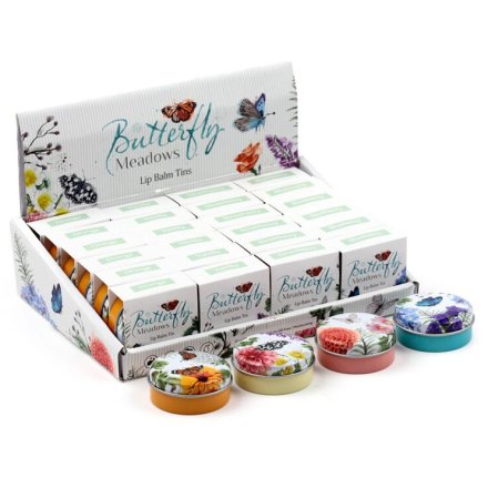 A lip balm in a miniature tin featuring a butterfly meadows design.