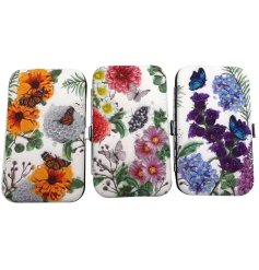 A portable charming manicure set with a floral design.