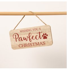 An adorable wooden sign with the words "Wishing you a pawfect Christmas" 