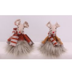 An assortment of two charming fabric mice styling autumn-themed sweaters and coordinating scarves.