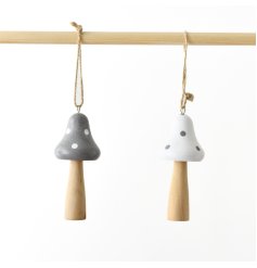 An assortment of two wooden mushroom hangers in white and grey. 