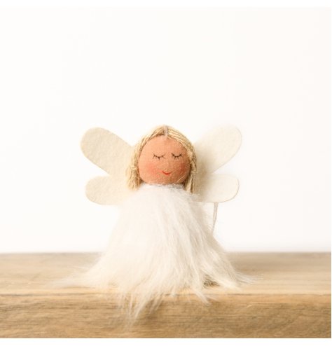 Get a charming and unique touch of Christmas spirit with this adorable angel for your beloved home.