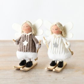 An assortment of two endearing little skiing angel