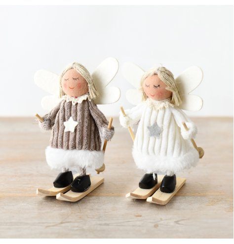 An assortment featuring two charming little skiing angels