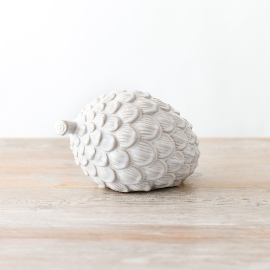 Add a touch of class to the home interior with this reactive glaze ornament. 