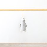 A charming ceramic penguin hanger, guaranteed to add a sprinkle of winter wonderland magic to any festive decoration.