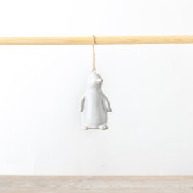 A delightful ceramic penguin hanger, certain to infuse a hint of winter wonderland magic into any festive decoration