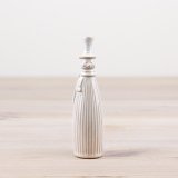 Get into the holiday spirit with our charming ceramic snowman ornament