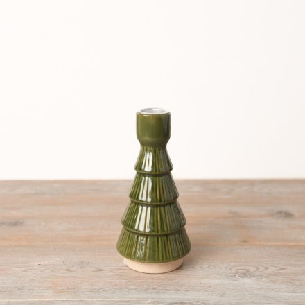 A stylish dinner candle holder in a rich forest green, crafted from ceramic and adorned with a beautiful textured glaze.