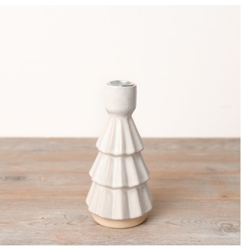 An effortlessly elegant and delightful Christmas tree dinner candle holder.