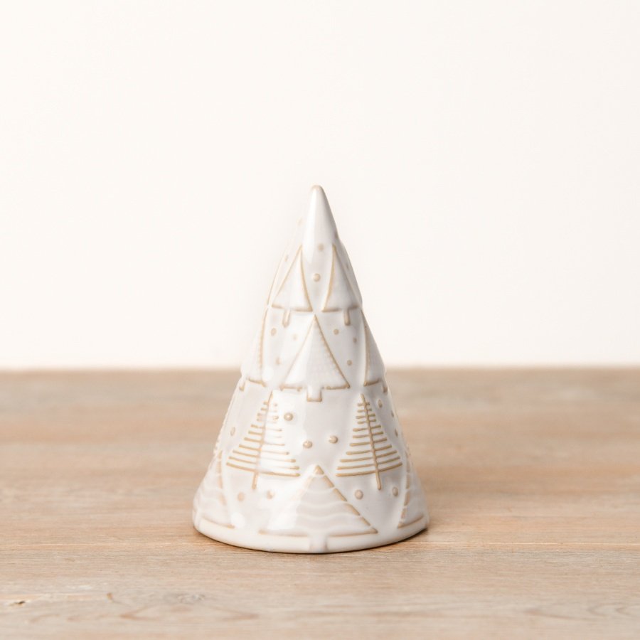 A beautiful ceramic Christmas tree adorned with embossed festive trees