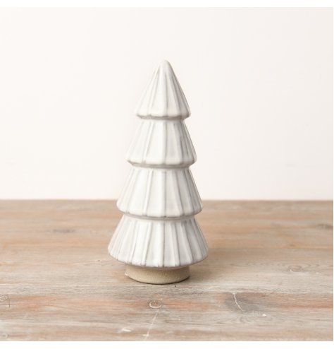 A chic Christmas tree decoration with a textured surface and stripe detailed. 