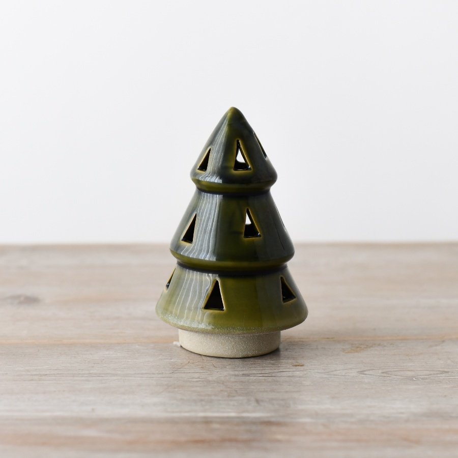 A fashionable and elegant LED tree featuring triangular cutouts, presented in a striking forest green natural glaze