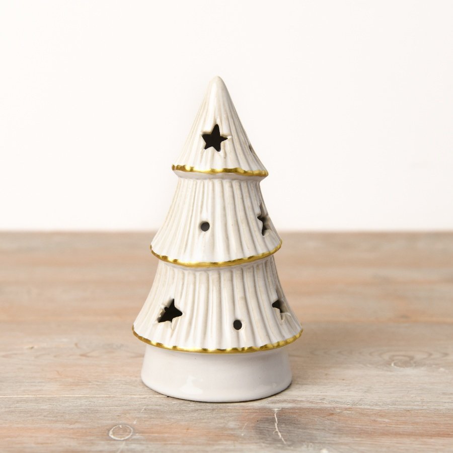 A stunning LED tree featuring a natural white glaze, gold embellishments, and charming star cutouts.