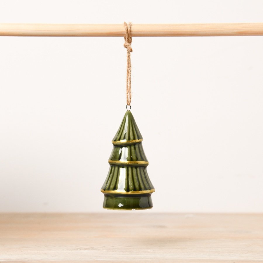 An on-trend ceramic tree hanger, adorned in a fashionable green with gold accents