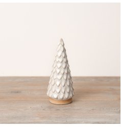 A beautiful tree with scalloped edges, adorned with reactive glaze in stunning neutral hues. 