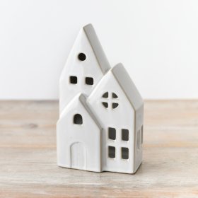 Add a charming touch to your decor with House-l - the ceramic house featuring built-in LED lights.