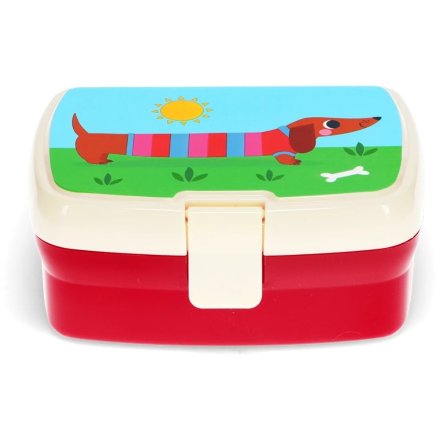 A bright and colourful children's lunch box featuring a lovely print of a sausage dog in an outdoor scene.