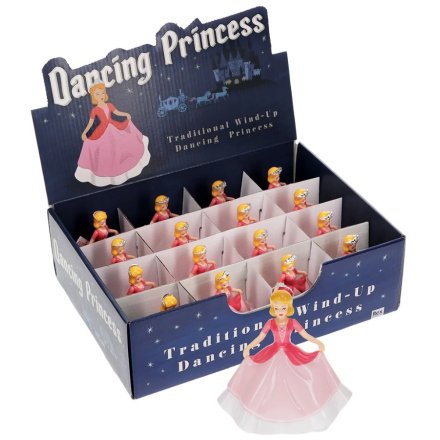 A pretty wind up dancing princess wearing a beautiful pink gown and silver crown. 