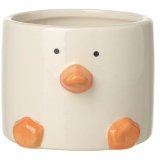 A super adorable duck planter with 3d beak and feet details.