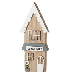 A charming ornament of a wooden flower shop, adorned with three-dimensional wooden elements.
