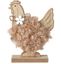  A cute wooden chicken decoration featuring a fluffy body and adorned with wooden daisy and jute string details.