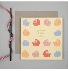 An adorable new baby greetings card adorned with little crib illustrations. 