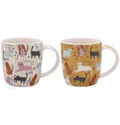 A white and yellow ceramic mug detailed with colourful cats.