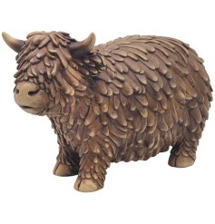 A large bronze Highland Cow ornament.