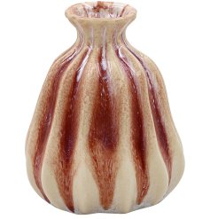 A miniature vase in brown and beige colours.