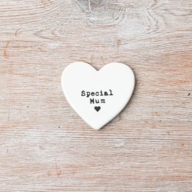 A dainty porcelain heart token bearing the sincere message "Special Mum."