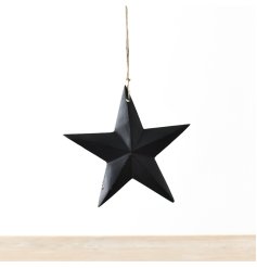 An elegant star-shaped hanger, finished in matte black and equipped with a jute string for han