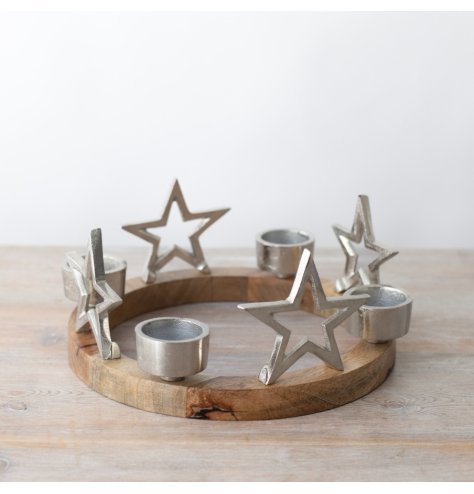 Enhance your dinner party with this stunning Metal Star Tea Light Candle holder ring decoration.