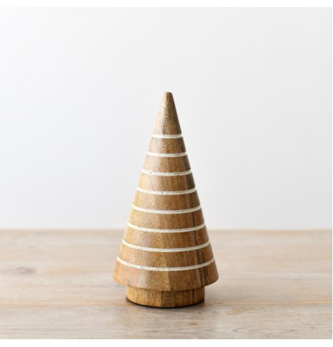 A beautifully stylish and elegant mango wood Christmas tree adorned with an engraved white stripe pattern