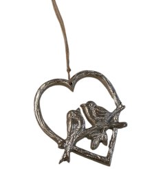 An endearing metal heart with two nestled birds in the center, adding a delightful touch of whimsy to enhance any space.